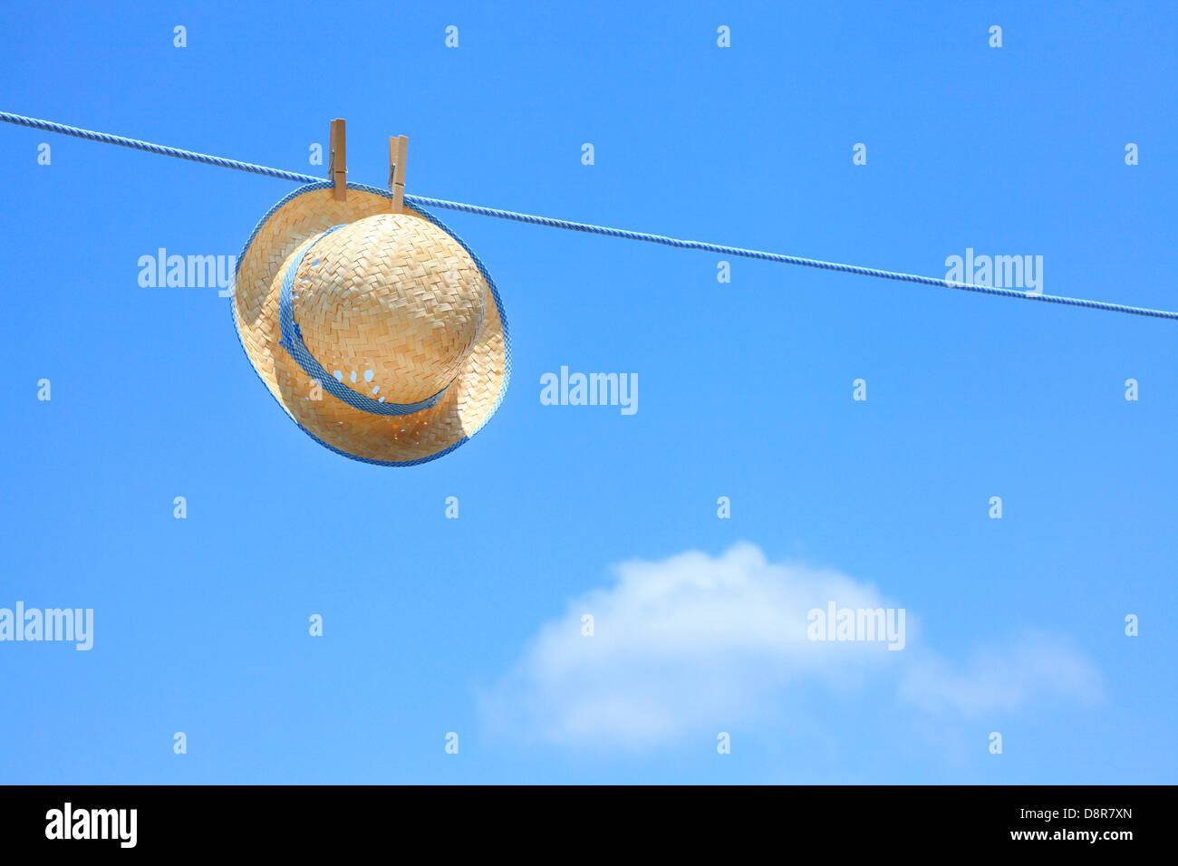 Straw hat and sky Stock Photo - Alamy