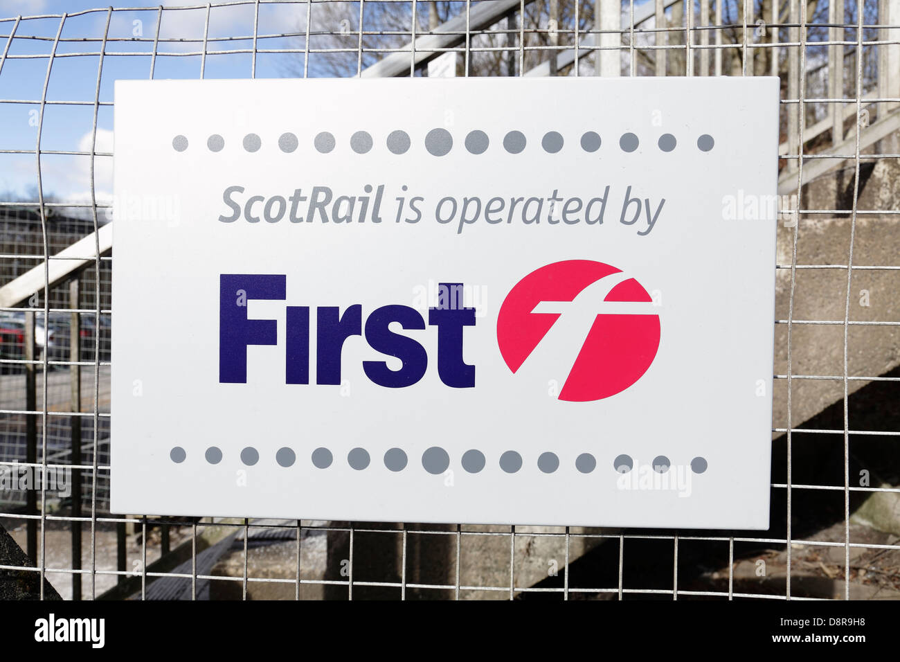 Scotrail is no longer operated by First Group. A Scotrail is operated by First Group sign, Scotland, UK Stock Photo