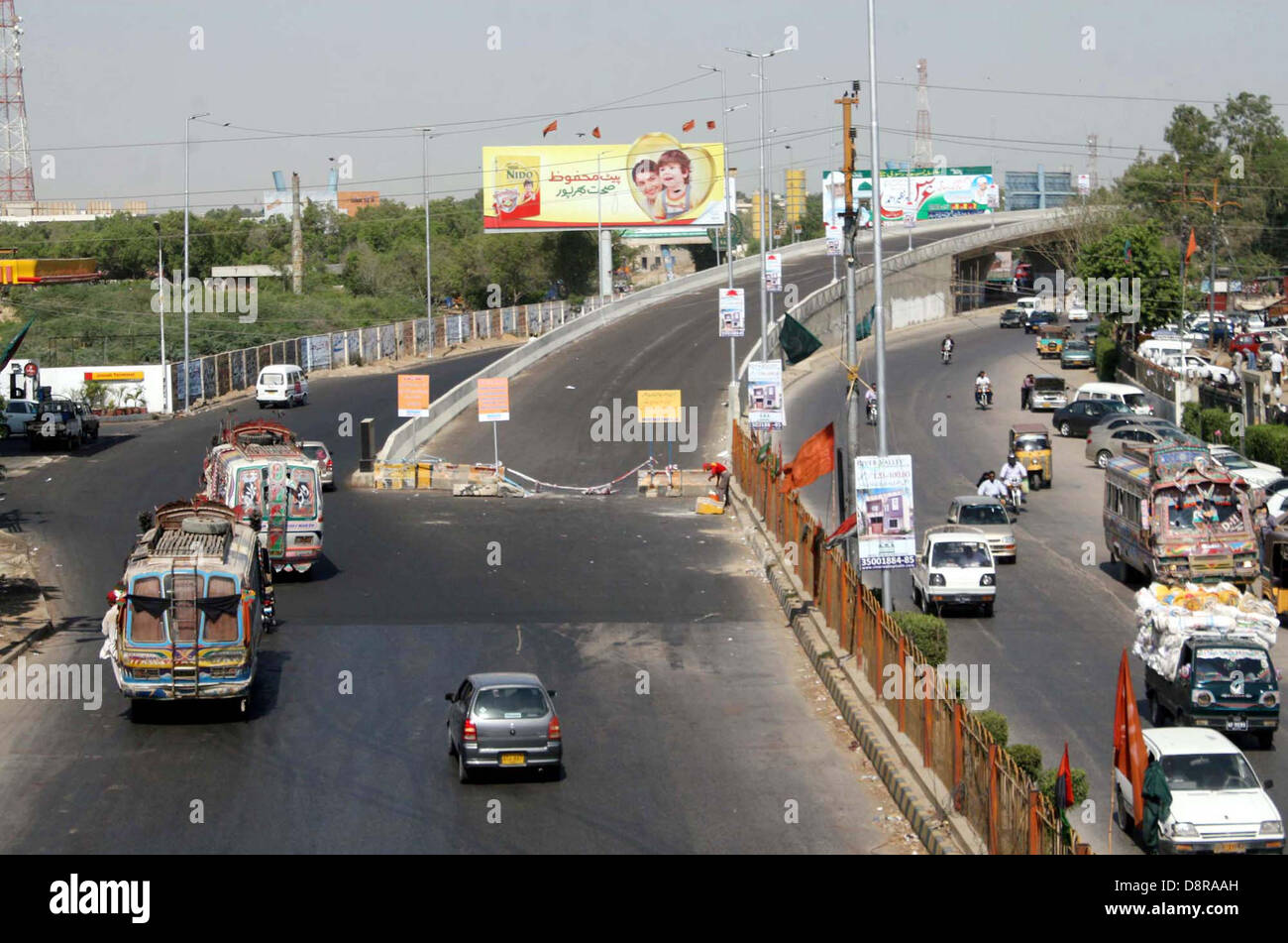 Newly constructed flyover is being closed for traffic even after inauguration by Sindh Governor, Ishtar-ul-Ebad Khan due to final touch near Star Gate on Shahrah-e-Faisal in Karachi on Monday, June 03, 2013. Stock Photo