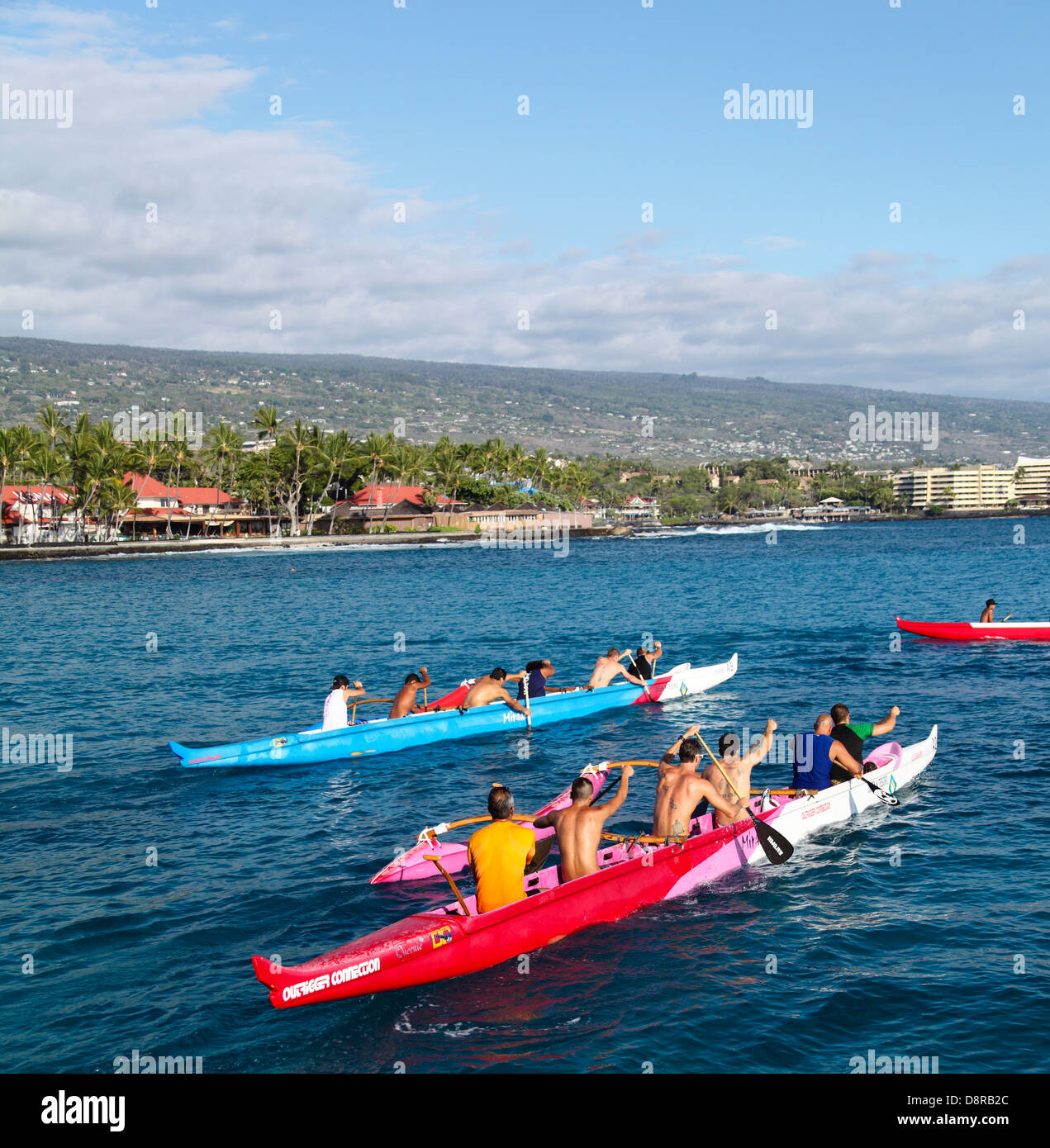 Outrigger canoes in Kailua Bay on the Big Island of Hawaii Stock Photo