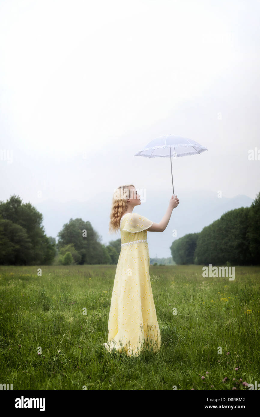 Girl with parasol hi-res stock photography and images - Alamy