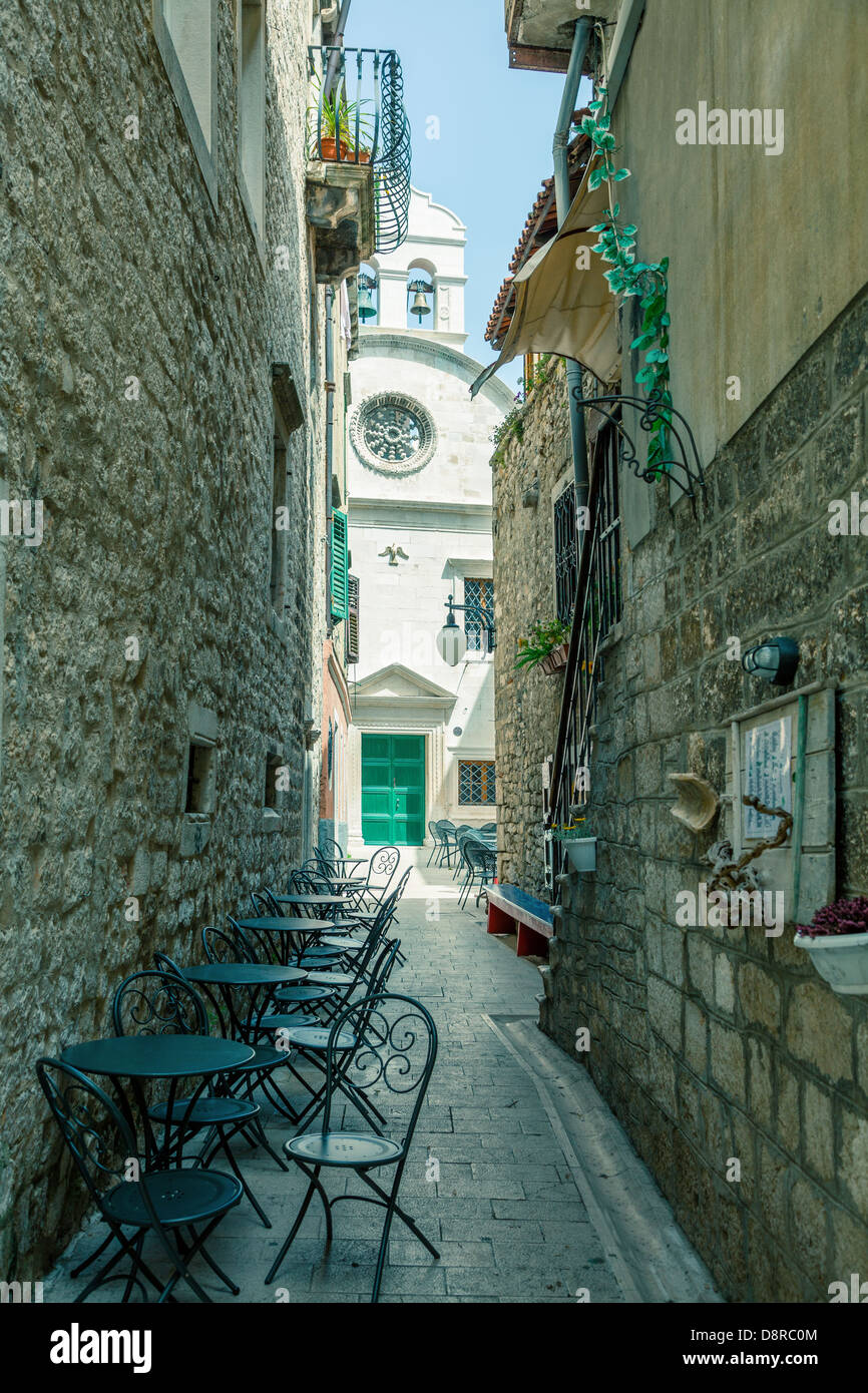 Atmospheric cafe in a narrow street in city of Zadar, Dalmatia, Croatia Stock Photo
