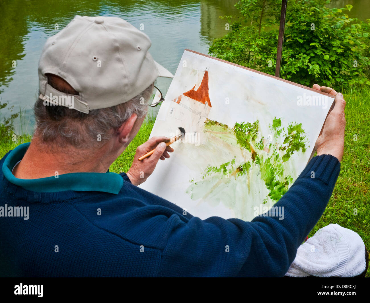 Outdoor amateur artist / painter at work - France. Stock Photo