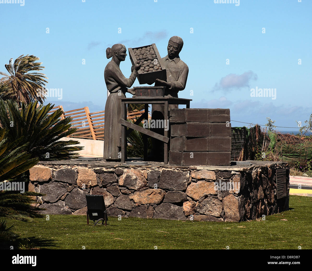 'Homage to the tomato growers' sculpture, on a roundabout in Carrizal, Gran Canaria. Stock Photo