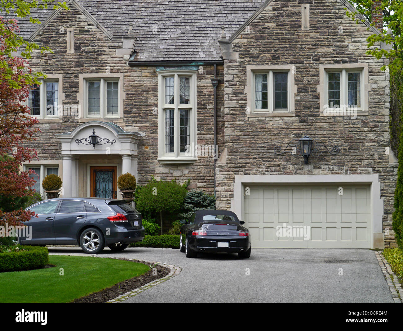 large house with luxury cars Stock Photo