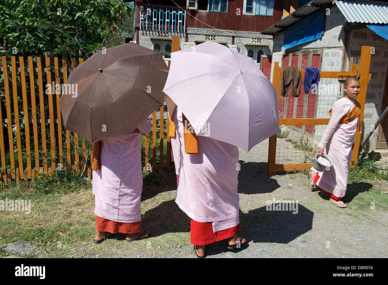 monks in Inle lake getting free things Stock Photo