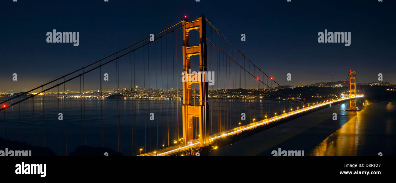 Light Trails on San Francisco Golden Gate Bridge at Blue Hour Evening Panorama Stock Photo