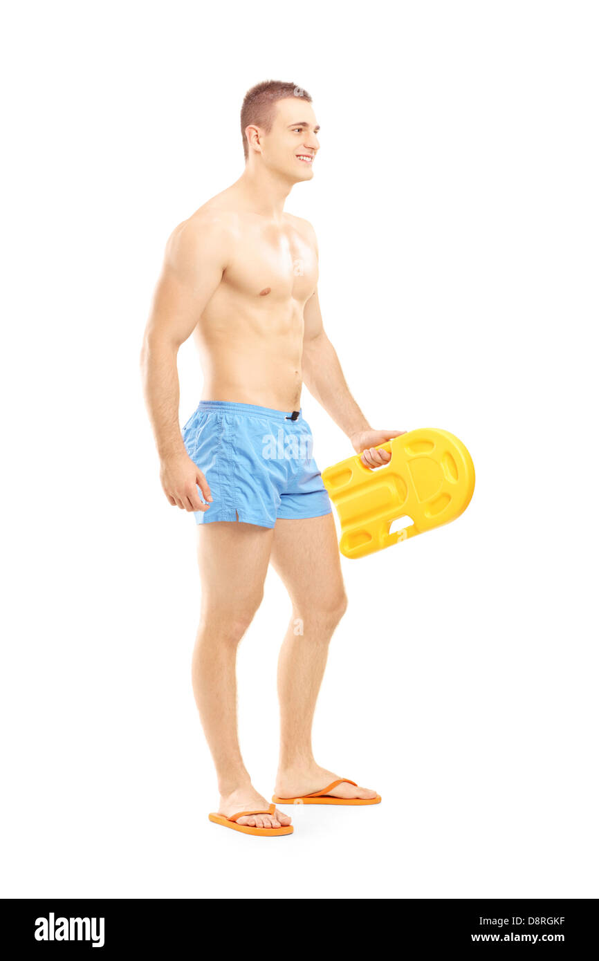 Full length portrait of a male lifeguard on duty posing isolated on white background Stock Photo
