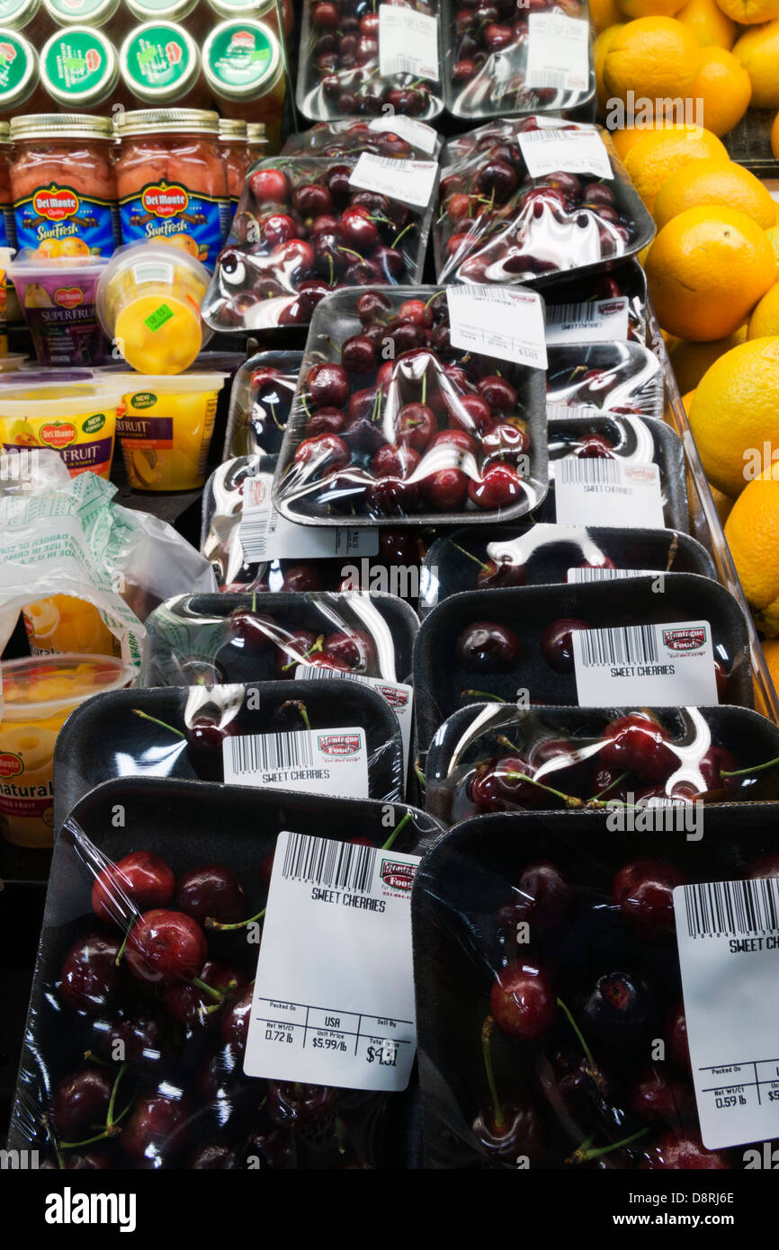 Sweet Cherries on display in a grocery store Stock Photo Alamy