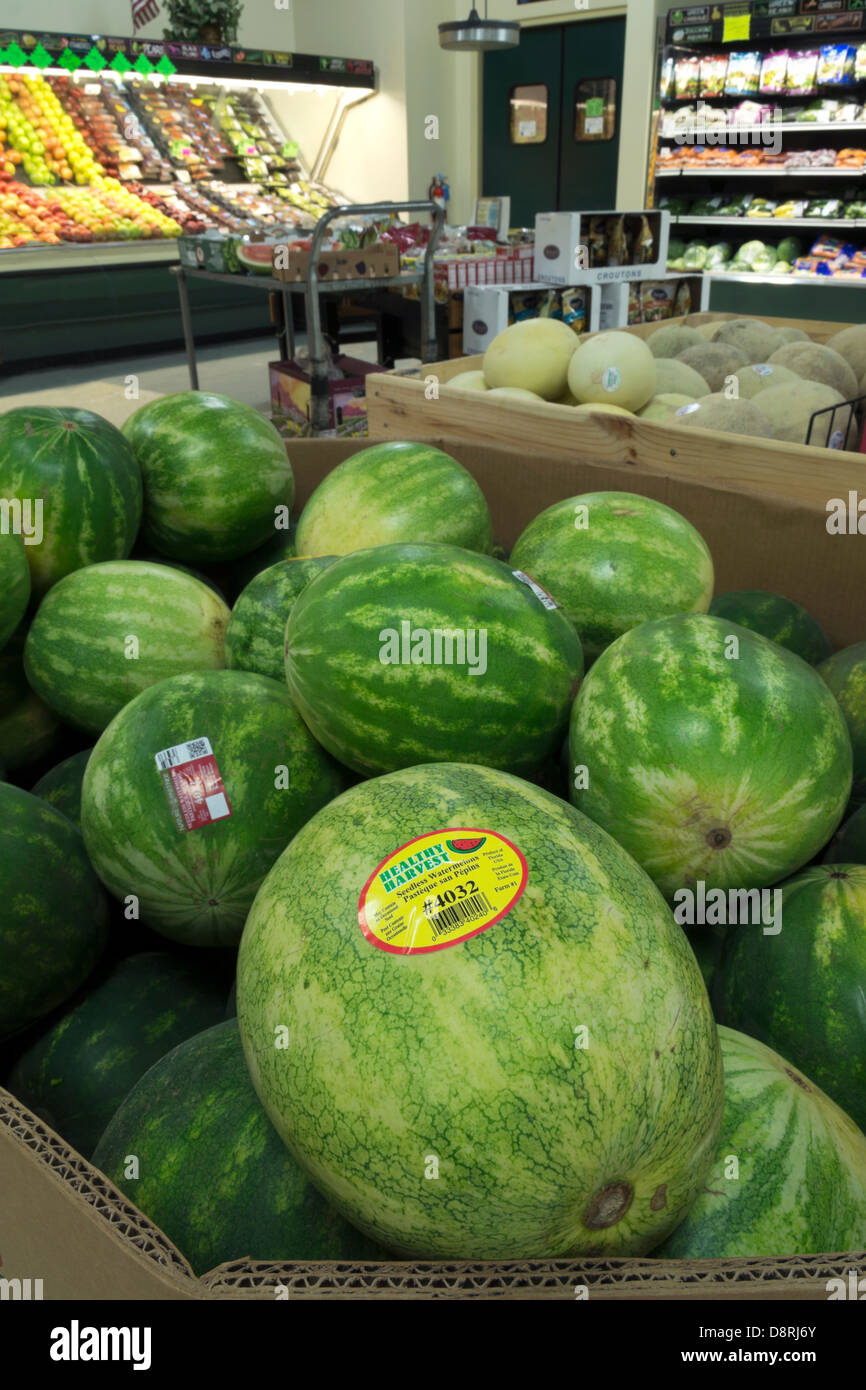 Watermelons on display at a family owned grocery store in Montague, MI, USA Stock Photo
