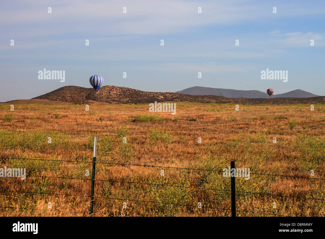 Colorful hot air balloons in flight over wine country at the Temecula Balloon and Wine Festival Stock Photo