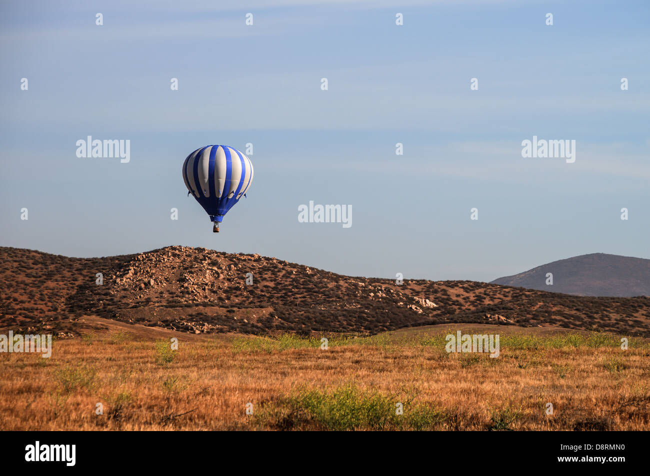 Colorful hot air balloons in flight over wine country at the Temecula Balloon and Wine Festival Stock Photo