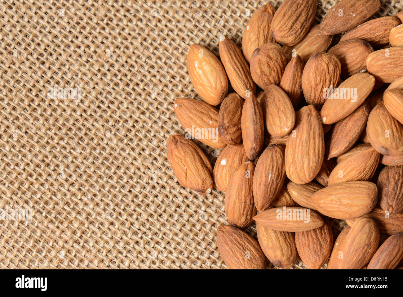 Almonds on a Burlap Background Stock Photo
