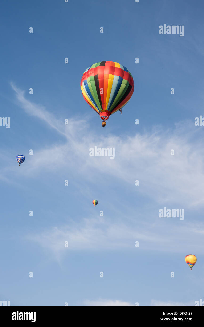 Colorful hot air balloons in flight over wine country at the Temecula