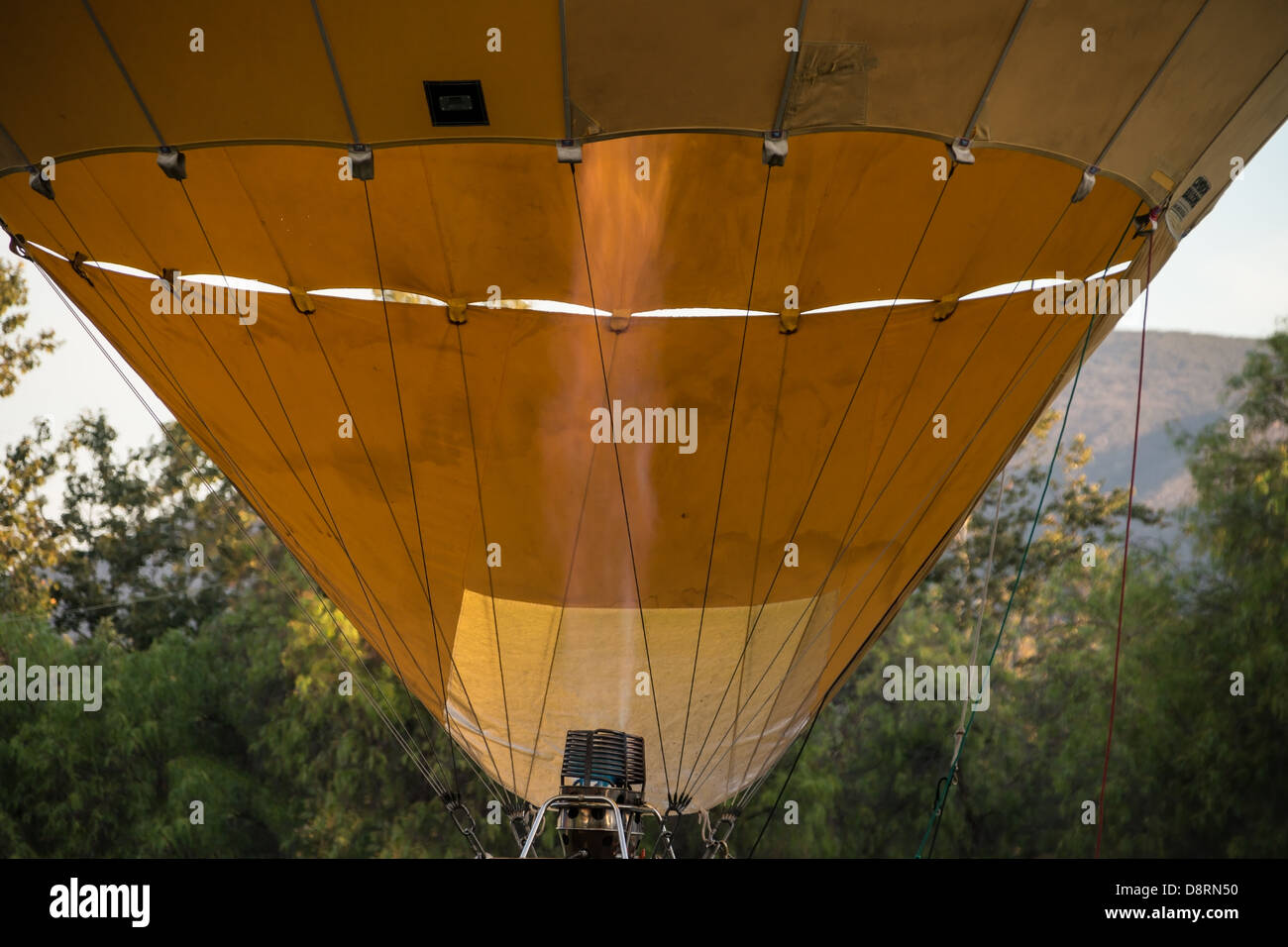 Propane fueled flames glowing inside hot air balloon Stock Photo Alamy