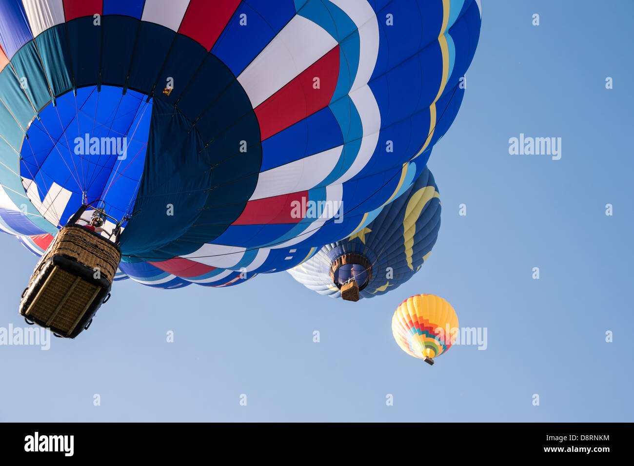Colorful hot air balloons in flight over wine country at the Temecula
