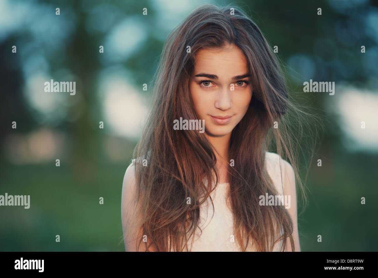young beautiful girl with long hair portrait Stock Photo - Alamy