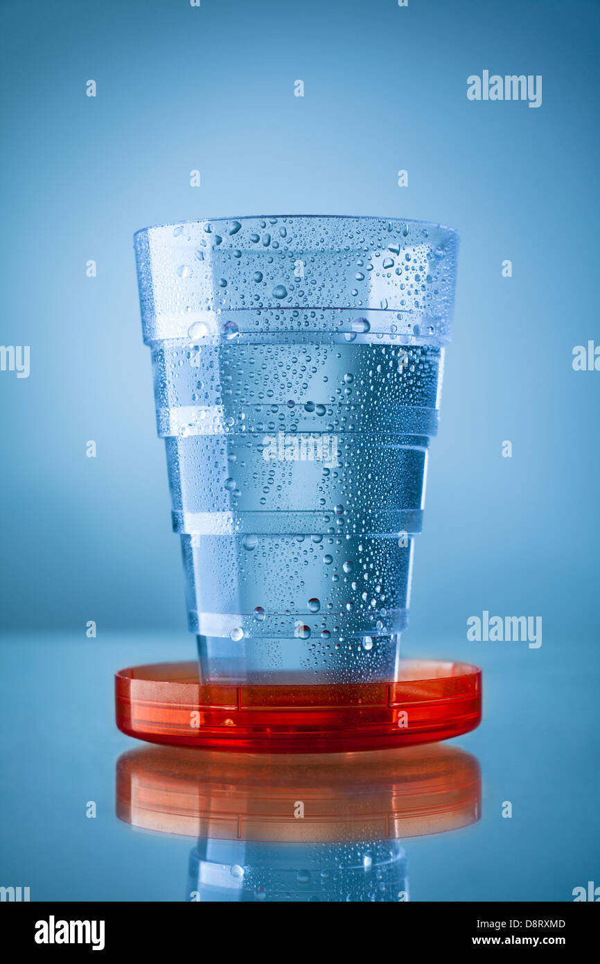 Collapsible Plastic Glass Filled with Water Stock Photo