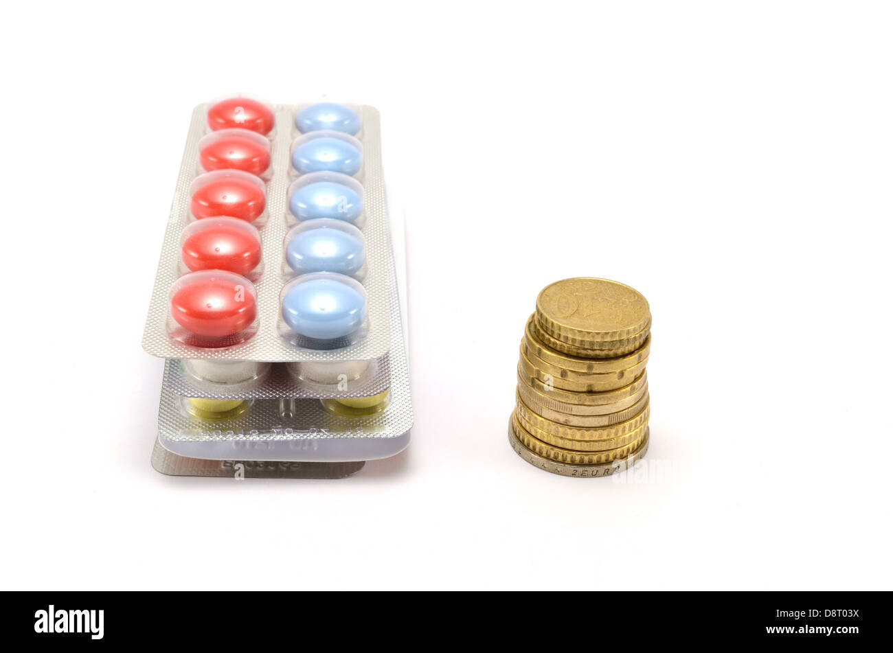 One Tablet One Coin tablets and coins on white background Stock Photo - Alamy
