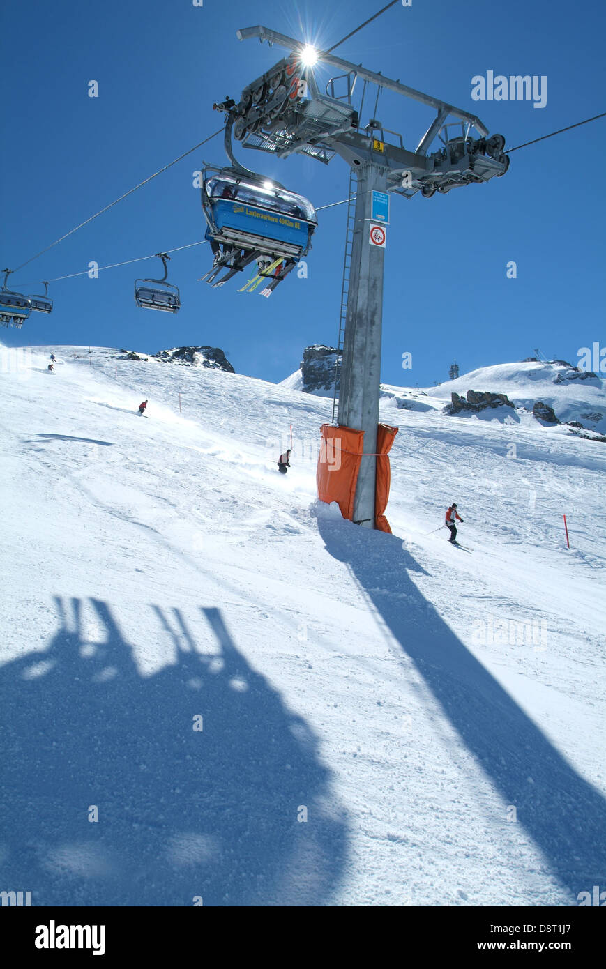 Skilift on mount Titlis over Engelberg on the Swiss alps Stock Photo