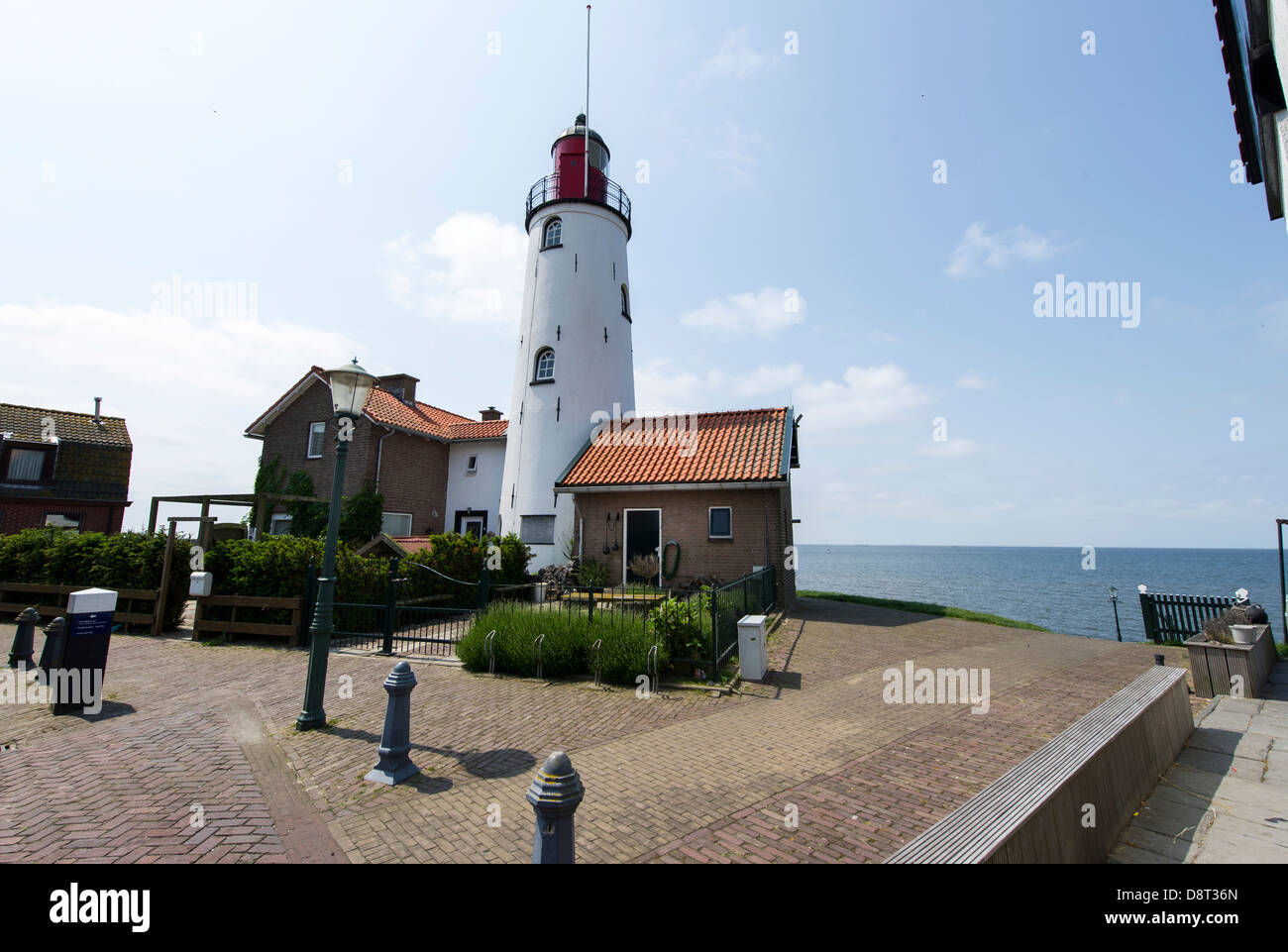 Urk Lighthouse, 18,5 meters high and was build in 1844. Its the only lighthouse at the IJsselmeer with fresnle lens Stock Photo
