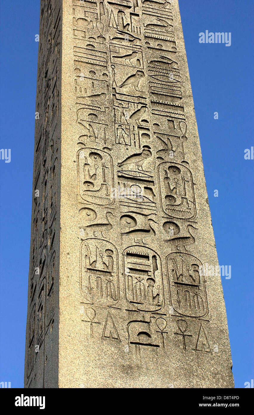 Hieroglyphics on the ancient Egyptian obelisk from Luxor in the Place de la Concorde, Paris. Digital photograph Digital photograph Stock Photo