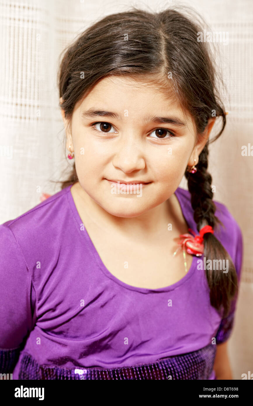 Little girl in purple dress Stock Photo Alamy