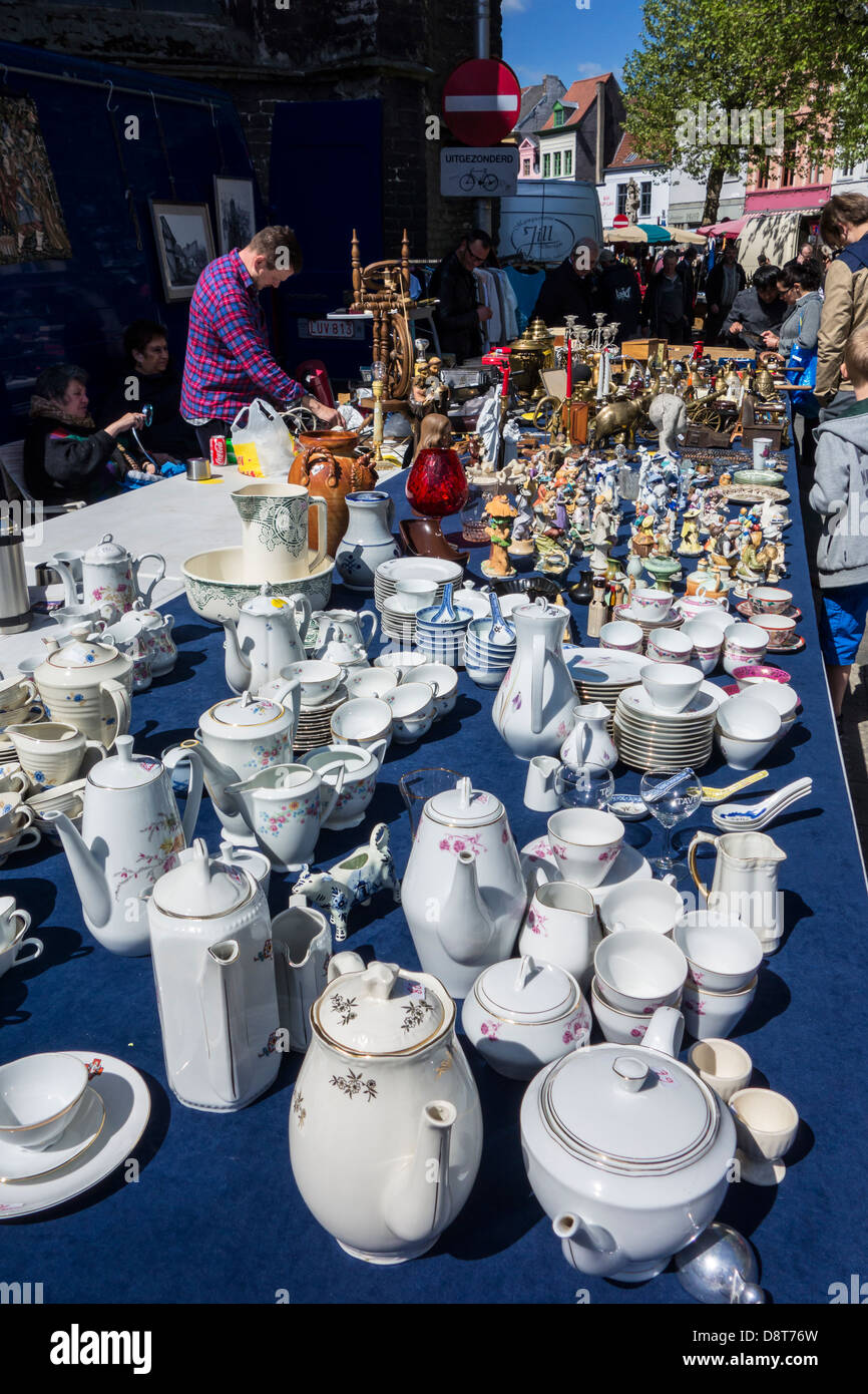 Antique porcelain crockery for sale at flea market at the St. Jacobs square in Ghent, Belgium Stock Photo