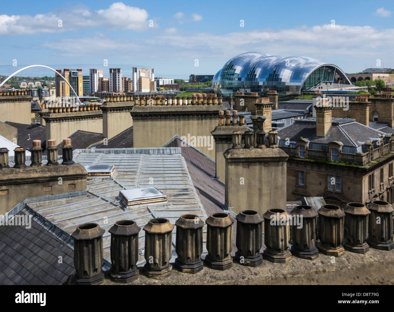 View over chimneys from The Tyne Bridge to The Gateshead Sage. Newcastle upon Tyne, England, UK Stock Photo