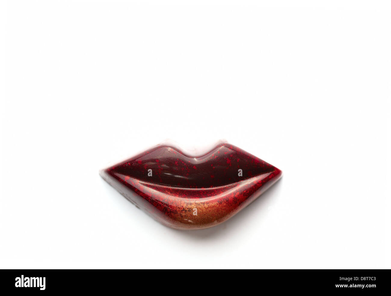 Chocolate lips on white background Stock Photo - Alamy