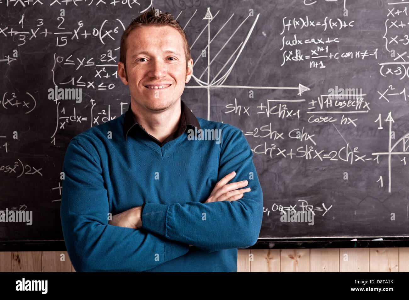 portrait of caucasian teacher and blackboard Stock Photo