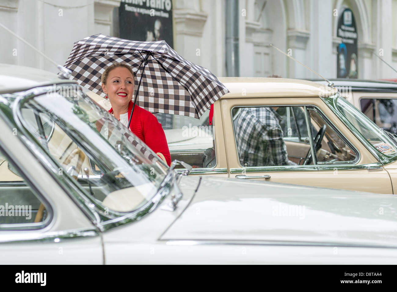 MOSCOW, RUSSIA - Retro festival 'Days of history' in Hermitage Garden. Old-fashioned woman with umbrella. Moscow, May 26, 2013 Stock Photo