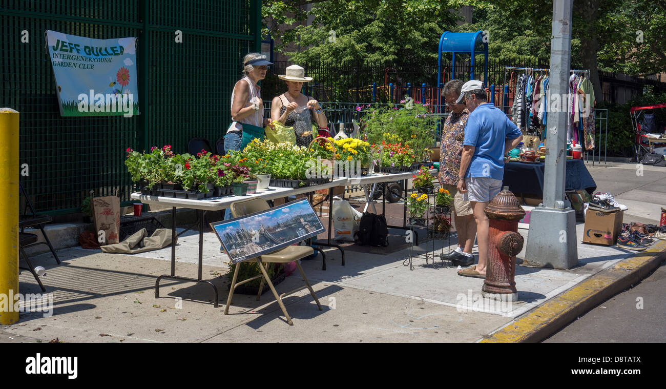 Shoppers search for bargains at a flea market in the New York