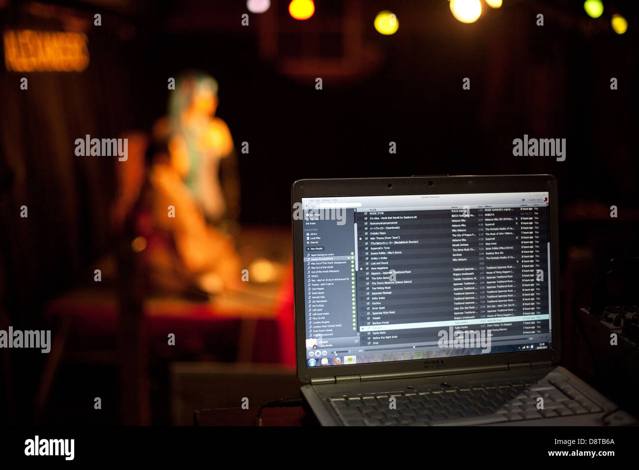 Detail of stage manager's laptop controlling music for a performance onstage by two characters Stock Photo