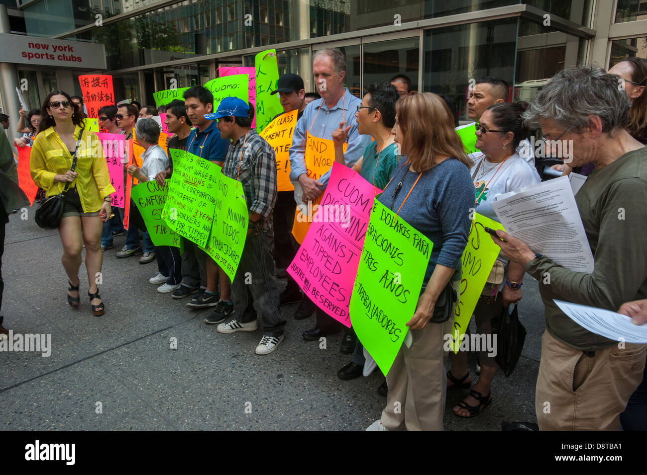 Minimum wage workers and their supporters rally to raise the minimum wage Stock Photo