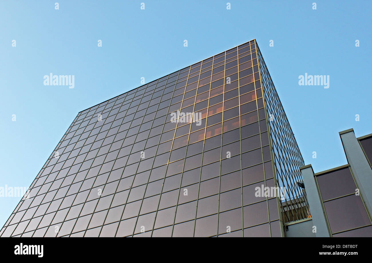 office building over blue sky Stock Photo - Alamy
