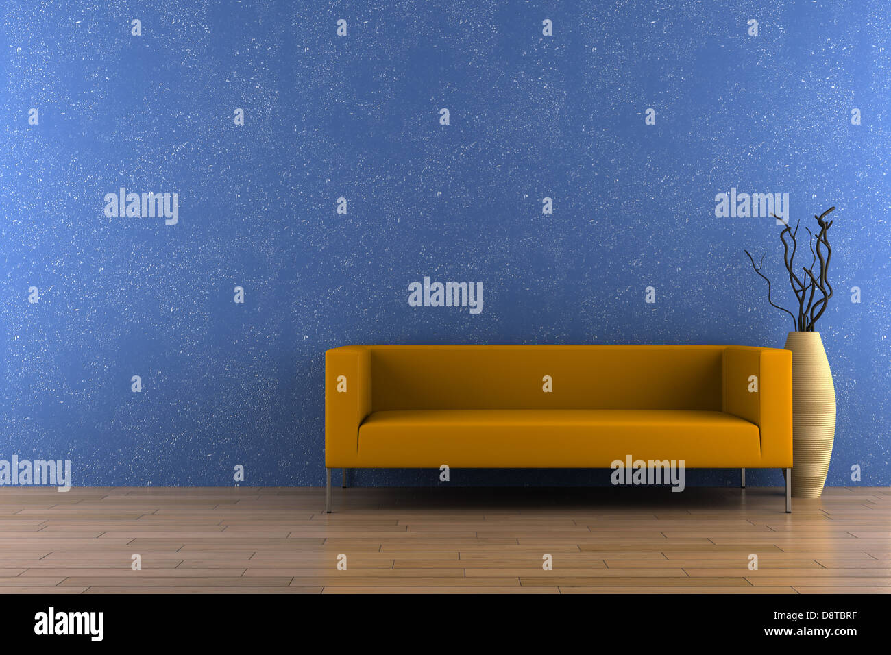 orange sofa and vase with dry wood Stock Photo