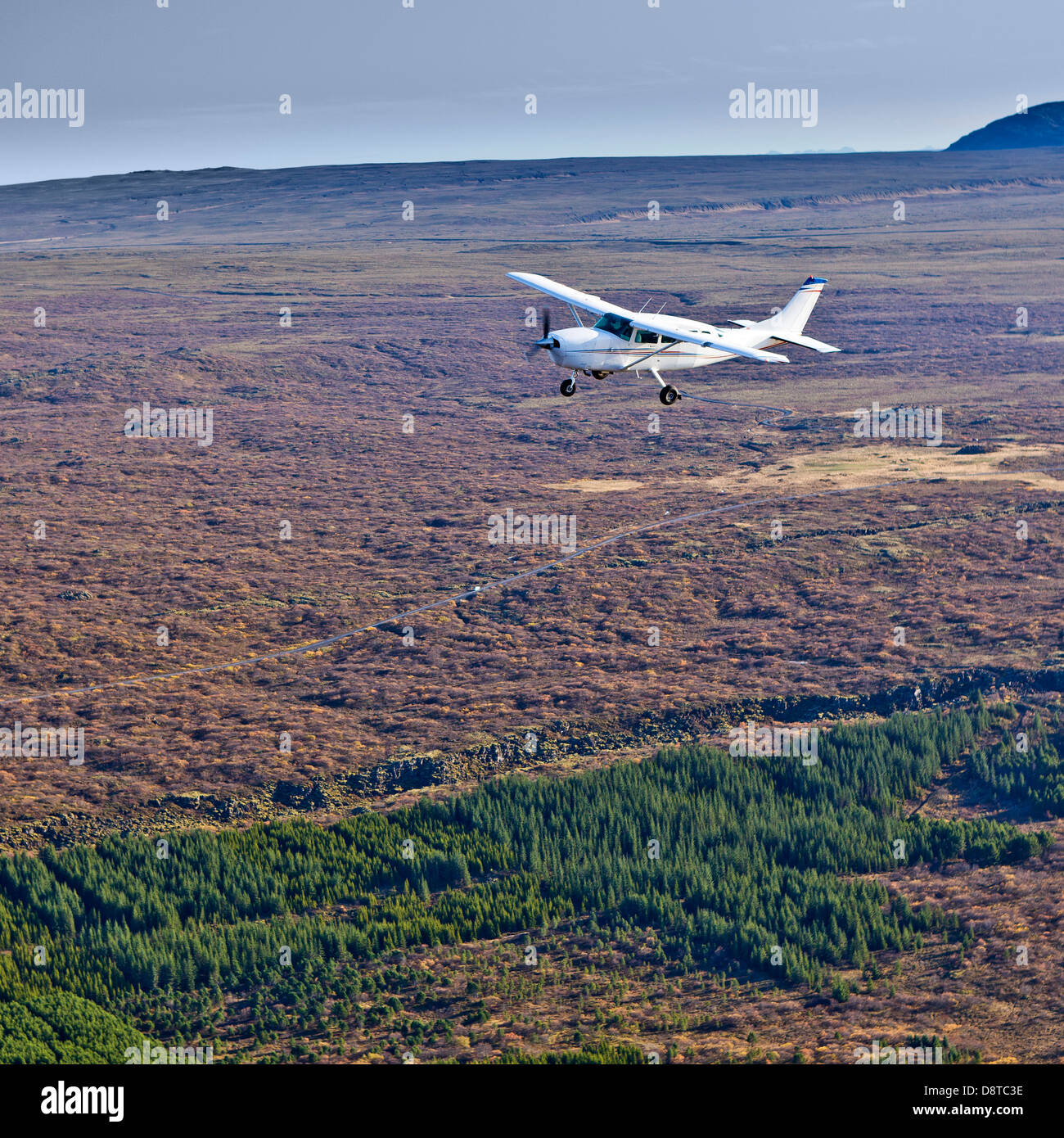 Cessna flying over South Coast in Iceland Stock Photo