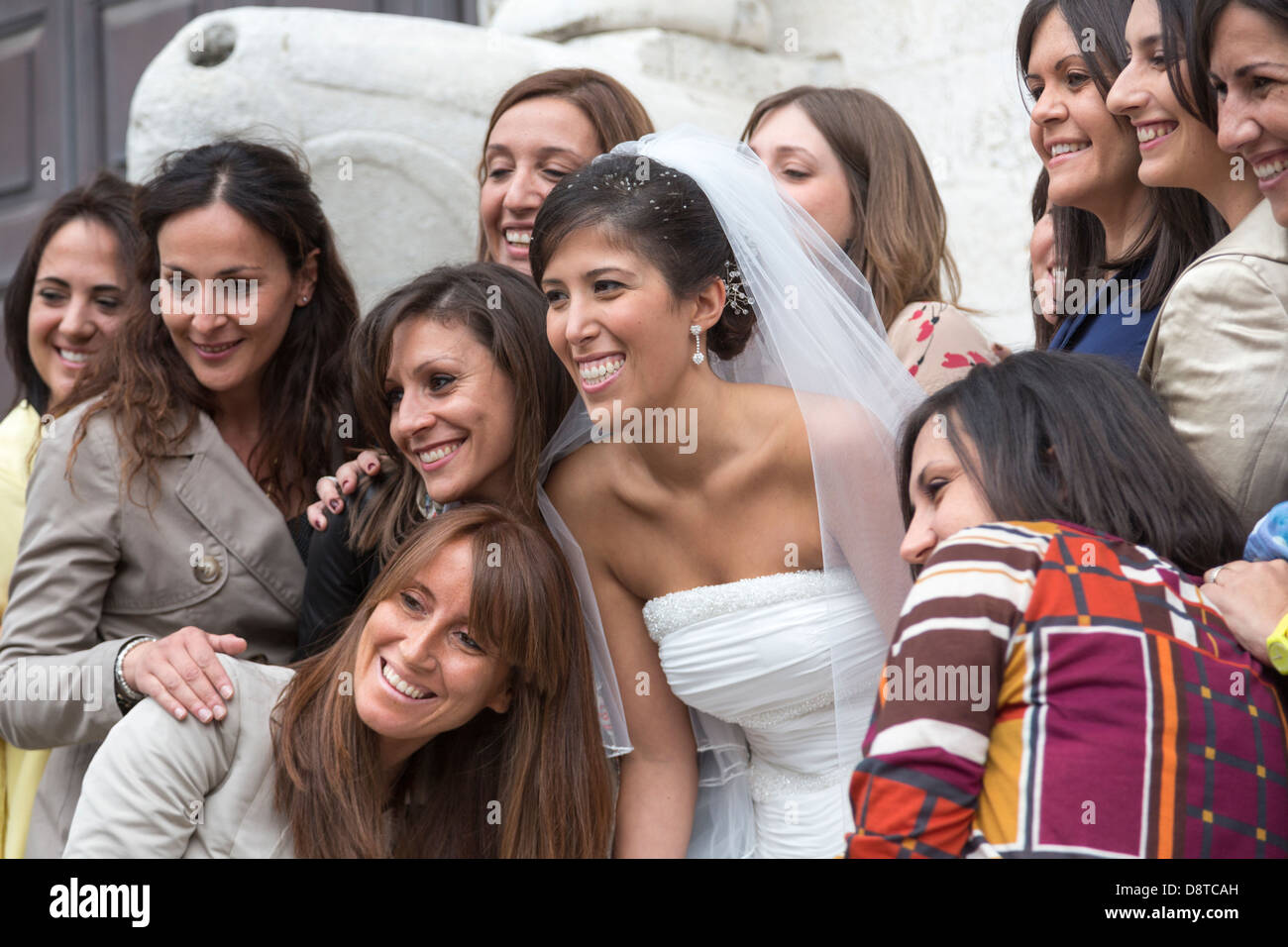 bride and friends posing outside basilica di San Nicola, Bari, Apulia Italy Stock Photo