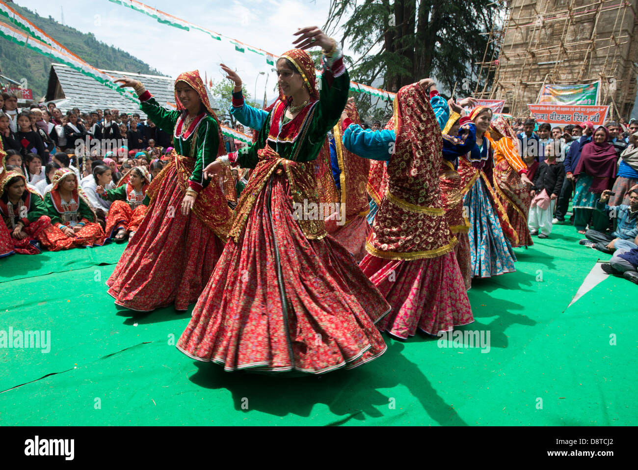 A troupe of Gaddi tribeswomen perform a local folk dance in the Chamba district of Himachal Pradesh, India Stock Photo