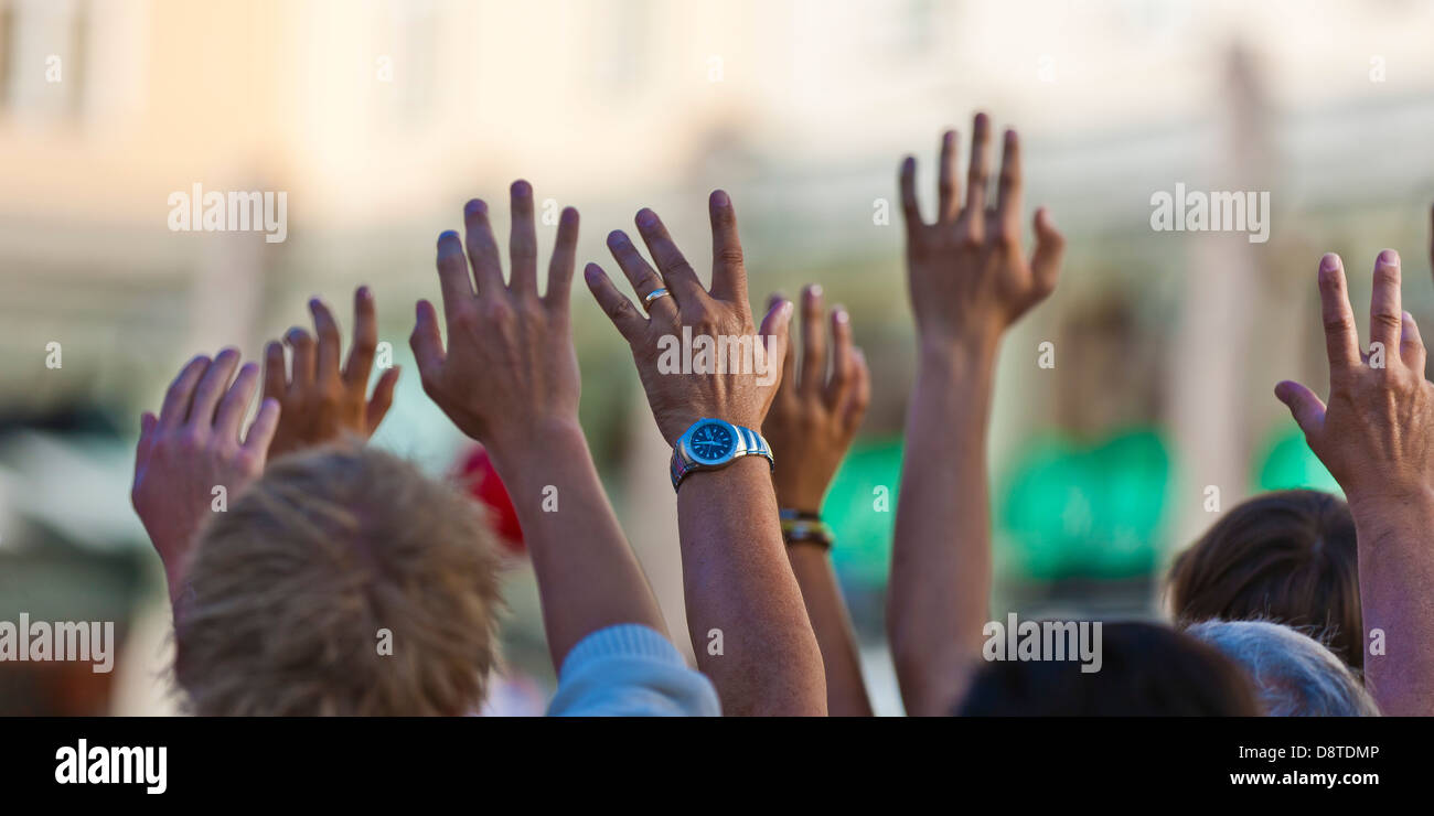 Hands waving at cruise ship, Bergen, Norway. Stock Photo