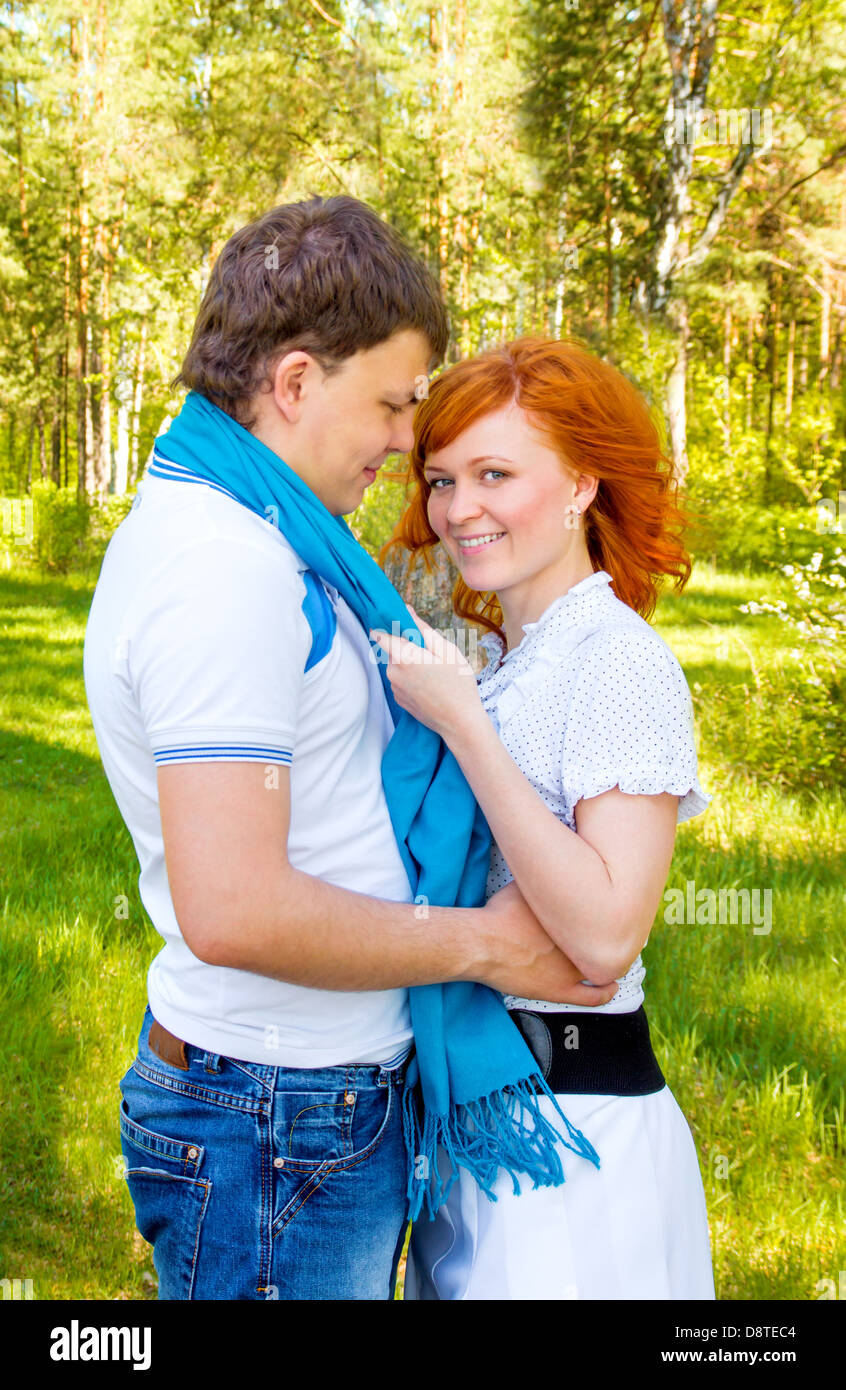couple young love woman man scarf happy park Stock Photo
