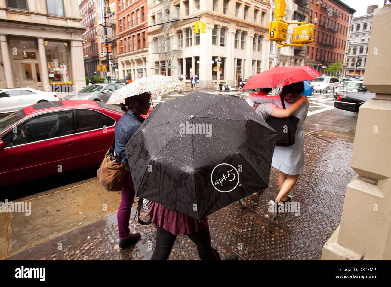 People with umbrellas, Manhattan, New York, United States of America Stock Photo
