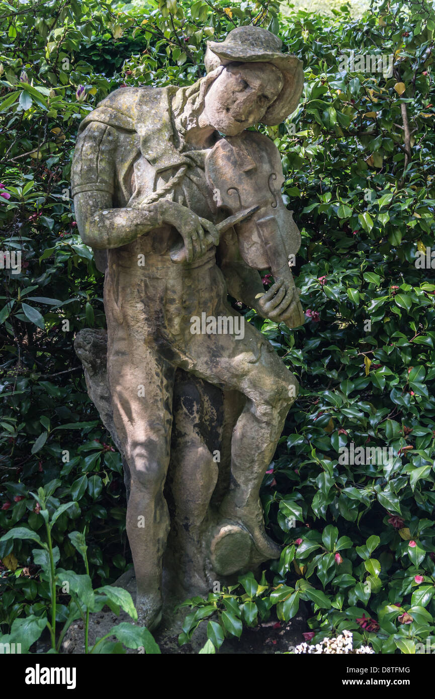Statue of an old Scottish fiddle player in the grounds of Holyrood Palace, Edimburgh. Stock Photo