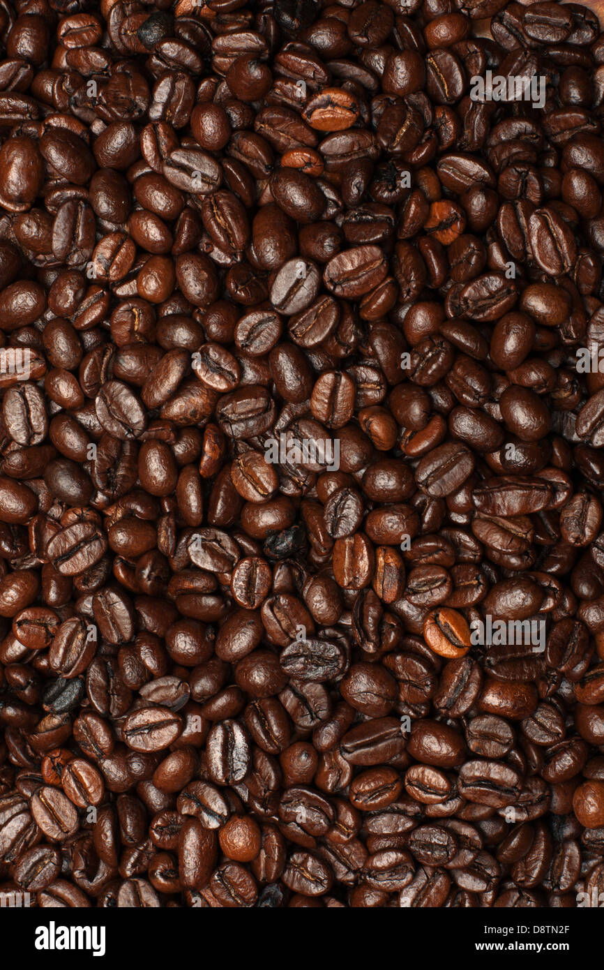 the background of coffee beans close up Stock Photo - Alamy
