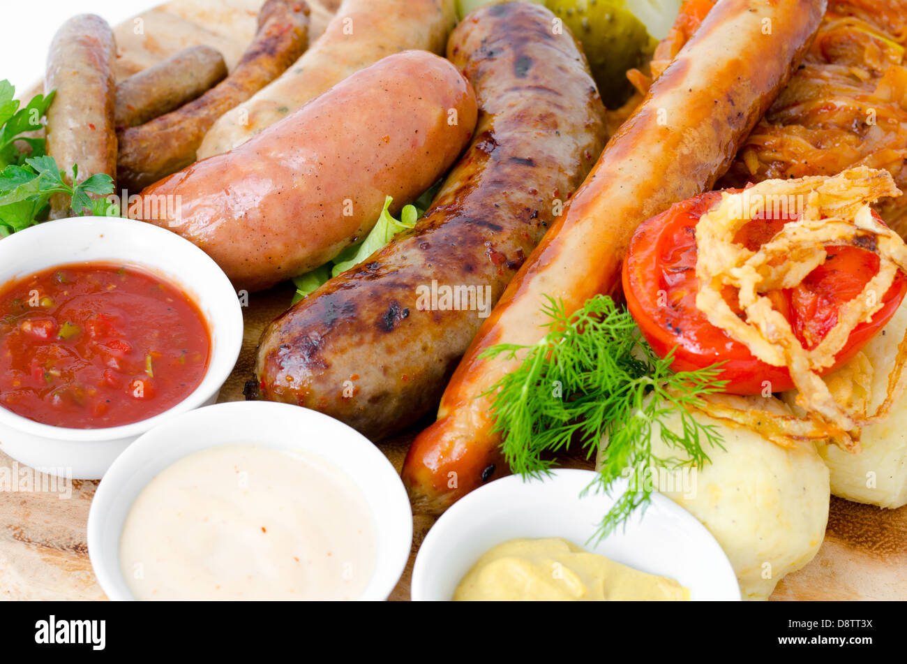 various sausages with sauces Stock Photo