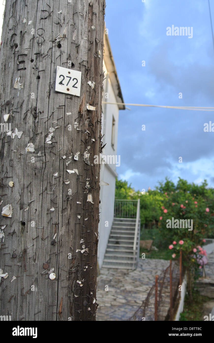 An aging overused wooden post in Kassiopi; Corfu, Greece. Stock Photo