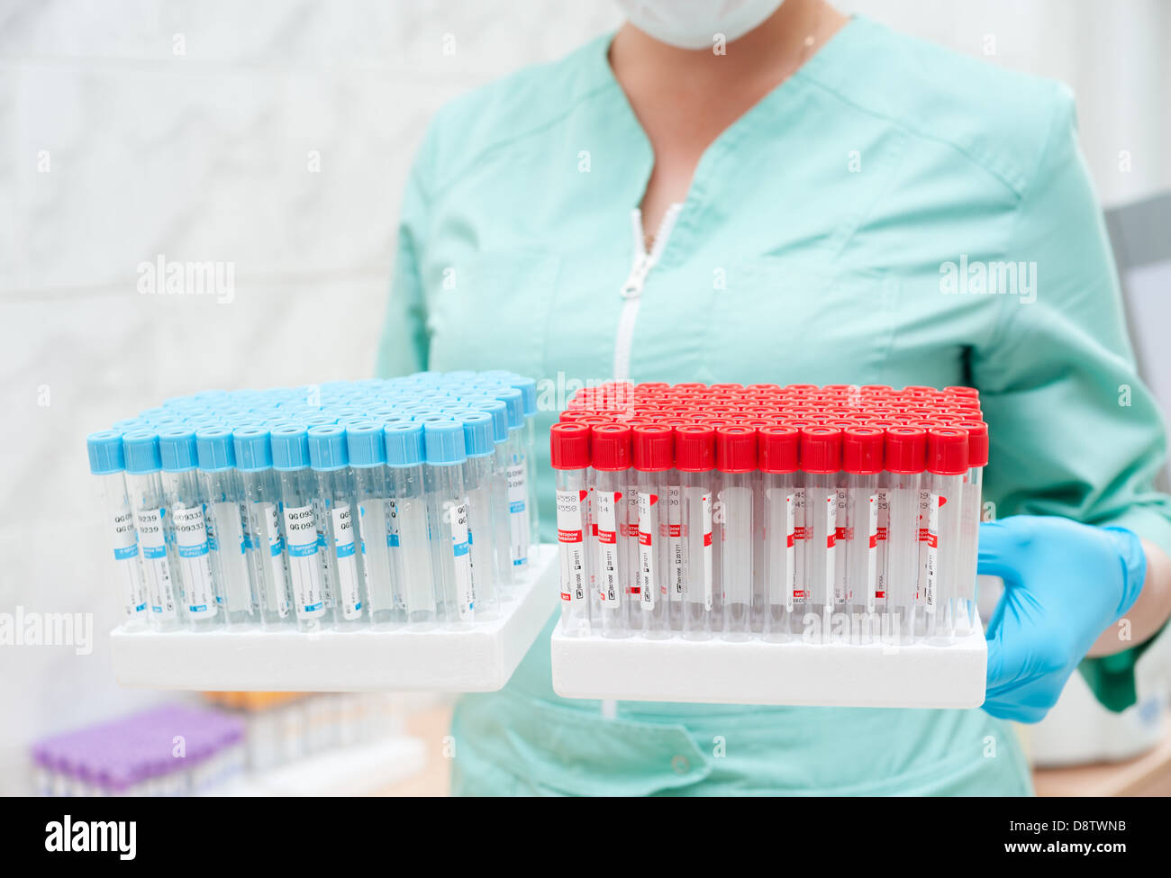 test tubes in nurses hands Stock Photo