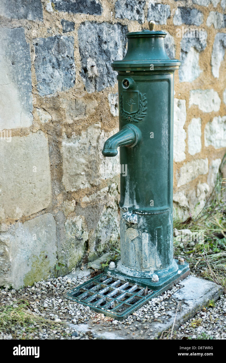 A Public French water pump Stock Photo