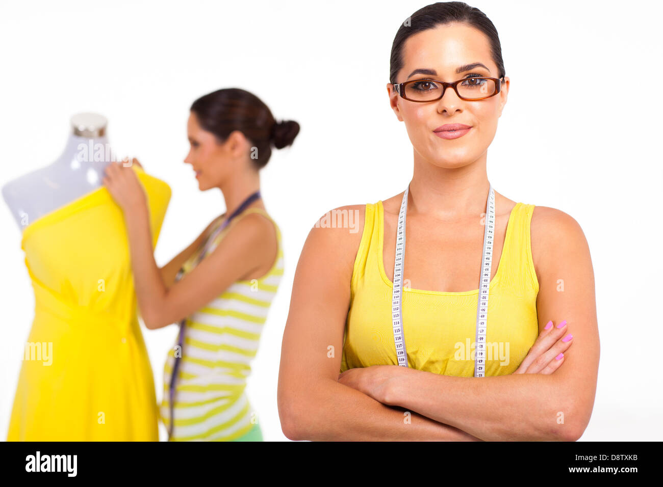 pretty young female dressmaker portrait on white Stock Photo Alamy
